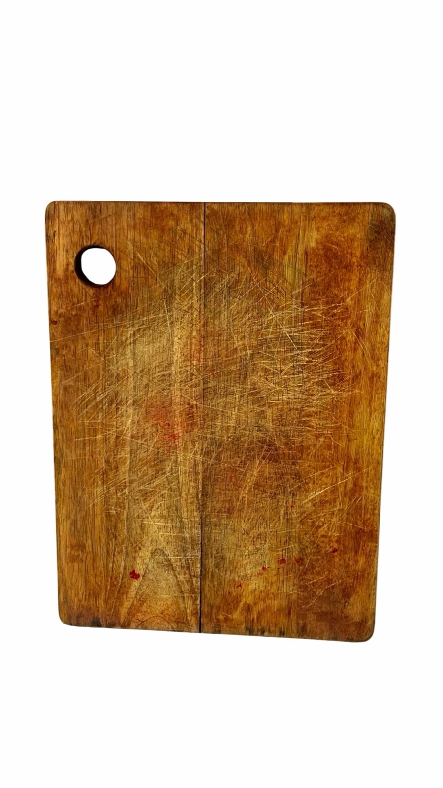 Tabla de cortar de madera con agujero