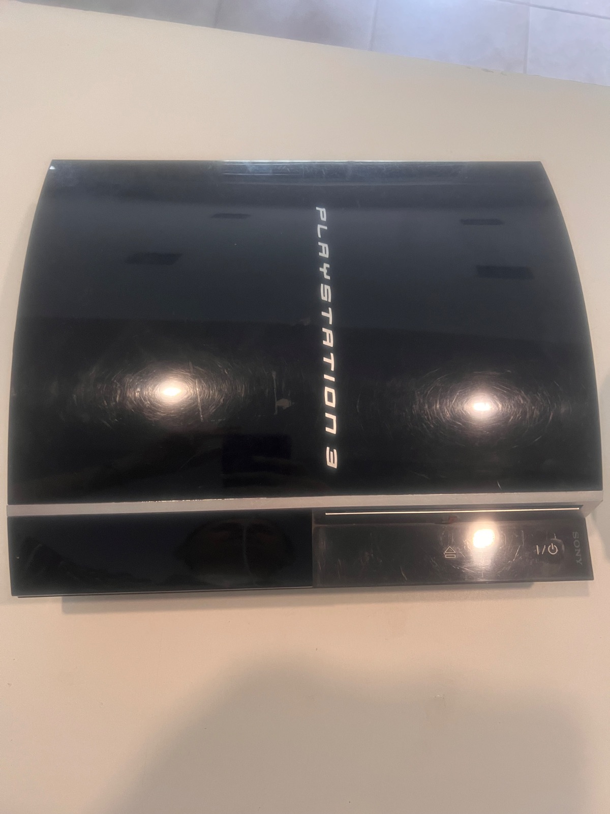 PlayStation 3 con joysticks y juegos